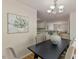 Elegant dining room with a stylish chandelier and comfortable seating at 5801 Forest Point Rd, Raleigh, NC 27610