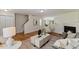 Spacious living room with hardwood floors, fireplace, and a cozy atmosphere at 5801 Forest Point Rd, Raleigh, NC 27610