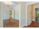Open-concept dining room featuring hardwood floors, and natural light, suitable for everyday meals and entertaining at 605 Glen Eden Dr, Raleigh, NC 27612