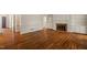 Spacious living room featuring hardwood floors and a fireplace at 605 Glen Eden Dr, Raleigh, NC 27612