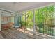 Spacious outdoor deck showing wood floors, railings, and a nice outdoor view of the trees and landscape at 605 Glen Eden Dr, Raleigh, NC 27612