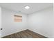 Bedroom featuring a window, hardwood floors and white walls at 606 Cecil Street St, Durham, NC 27707