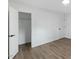 Bedroom featuring a closet and hardwood floors at 606 Cecil Street St, Durham, NC 27707