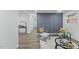 Stylish living area with modern decor, accent wall, and neutral color palette at 606 Cecil Street St, Durham, NC 27707