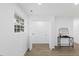 Bright room with a double door closet, and a table with a mirror on top of it at 606 Cecil Street St, Durham, NC 27707