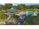 Community pool with bath house, playground, and seating areas at 617 Sealine Dr, Cary, NC 27519
