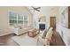 Comfortable living room featuring a fireplace, vaulted ceilings, and plenty of natural light at 617 Sealine Dr, Cary, NC 27519