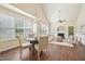 Bright and open living space featuring a fireplace, hardwood floors, and vaulted ceilings for a modern aesthetic at 617 Sealine Dr, Cary, NC 27519