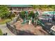 Community playground with slides and climbing features, and fenced for safety at 617 Sealine Dr, Cary, NC 27519