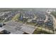 Expansive aerial view showcasing a well-planned residential community with lush green spaces and modern architecture at 6511 Academic Ave, Raleigh, NC 27616