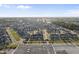 Aerial view showcasing the neighborhood's layout with well-maintained streets and diverse housing options, with a distant forest at 6511 Academic Ave, Raleigh, NC 27616