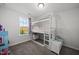 A cheerful bedroom featuring a loft bed and lots of room for storage and play at 6511 Academic Ave, Raleigh, NC 27616