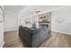 Stylish living room featuring a modern fireplace, hardwood floors, and an open layout at 6511 Academic Ave, Raleigh, NC 27616