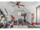 Home gym with various exercise machines, and a large window for natural light at 6512 Southern Times Dr, Raleigh, NC 27603