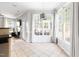 Breakfast area with ample natural light from the surrounding windows at 7 Wythebrook Ln, Durham, NC 27713
