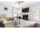 Living room with a fireplace and neutral decor at 7 Wythebrook Ln, Durham, NC 27713