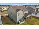 Home from above, featuring back patio, screened in porch, and large lawn at 7205 Tillage Rd, Mebane, NC 27302