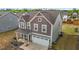 Picturesque home featuring pristine landscaping, and a 2-car garage in a desirable neighborhood at 7205 Tillage Rd, Mebane, NC 27302
