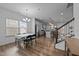 Bright dining area filled with natural light and an adjacent modern kitchen at 7205 Tillage Rd, Mebane, NC 27302