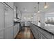 Gourmet kitchen with stainless steel appliances and a center island with granite countertops at 7205 Tillage Rd, Mebane, NC 27302