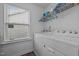 Laundry room featuring newer model washer and dryer with a window at 7205 Tillage Rd, Mebane, NC 27302