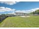 Spacious backyard with well-maintained lawn, fence, and gravel area, providing a versatile outdoor space at 7228 Lowery Meadow Dr, Wendell, NC 27591