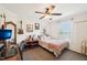 Bedroom showcasing a work space, ceiling fan, and window offering natural light at 7228 Lowery Meadow Dr, Wendell, NC 27591