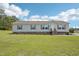 Charming single-story home with a well-manicured lawn and inviting front porch at 7228 Lowery Meadow Dr, Wendell, NC 27591