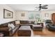 Comfortable living room with hardwood floors and ample seating at 7228 Lowery Meadow Dr, Wendell, NC 27591