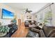 Spacious living room features hardwood floors and comfortable seating at 7228 Lowery Meadow Dr, Wendell, NC 27591