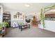 Inviting living room that flows into the dining area and an open-concept kitchen at 7228 Lowery Meadow Dr, Wendell, NC 27591