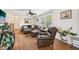 Warm and inviting living room with hardwood floors and comfortable seating at 7228 Lowery Meadow Dr, Wendell, NC 27591