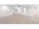 Spacious bedroom with neutral carpet and multiple entryways offers versatile and convenient layout options at 75 Rosewood Ln, Youngsville, NC 27596