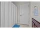 Bathroom featuring a shower with white curtain and a dark wood vanity at 8 Pal Ct, Benson, NC 27504