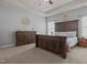Expansive main bedroom featuring trey ceilings, large windows, and hardwood floors at 8 Pal Ct, Benson, NC 27504