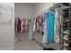Spacious walk-in closet with ample hanging space and shelving for shoe storage at 8 Pal Ct, Benson, NC 27504