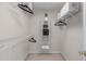 Walk-in closet featuring built in shelving, hanging rods, and boxes for easy and efficient organization at 8005 Somerdale Dr, Durham, NC 27713