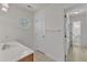 Bathroom featuring a decorative round window and a single sink at 8022 Hogan Dr, Wake Forest, NC 27587