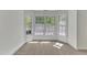 Bright bedroom featuring a large bay window, allowing ample natural light at 8022 Hogan Dr, Wake Forest, NC 27587