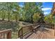 Wooden deck featuring built-in seating perfect for outdoor relaxation or entertainment at 8022 Hogan Dr, Wake Forest, NC 27587