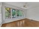 Living room with large windows at 8022 Hogan Dr, Wake Forest, NC 27587