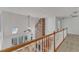Open loft featuring a high ceiling with skylights and a brick fireplace extending two stories at 8022 Hogan Dr, Wake Forest, NC 27587