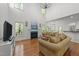 Grand living room with high ceilings, a fireplace, and elegant decor at 8212 Duck Creek Dr, Raleigh, NC 27616