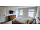 Comfortable bedroom featuring neutral walls, plush carpeting, and a light-colored bed at 8764 Kenridge Ln, Fuquay Varina, NC 27526