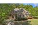 Home with a winding driveway, attached garage, and mature trees on a spacious lot at 903 Oldwyck Dr, Fuquay Varina, NC 27526