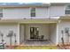 Backyard featuring a covered patio and sliding door at 918 E Green St # F105, Franklinton, NC 27525