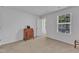 Bright bedroom with large window and traditional desk at 918 E Green St # F105, Franklinton, NC 27525