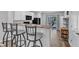Modern eat-in kitchen with barstool seating, sleek countertops and stainless appliances at 918 E Green St # F105, Franklinton, NC 27525