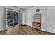 A bright room includes a sliding door to a patio, a storage cabinet and accent furniture at 918 E Green St # F105, Franklinton, NC 27525