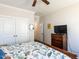 Bedroom featuring a full-sized bed, wood floors, and ample closet space at 937 Matterhorn Dr, Fuquay Varina, NC 27526